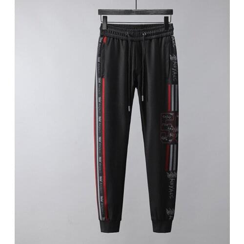 Mens Casual Pants Men 2021 Spring New Black Printing Streetwear Joggers Trousers Fashion Loose Trousers Pencil Pants For Men