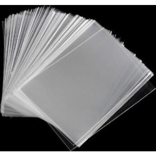 100pcs/lot 6.6*9cm Transparent Card Protector for Board Games Cards Card Sleeve Protector School Business Office Supplies