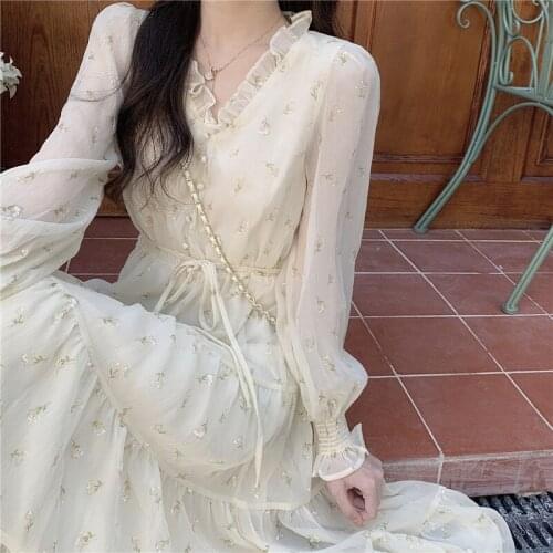 Temperament of floral bud silk dress sense of early spring tea French new female design long niche tenderness