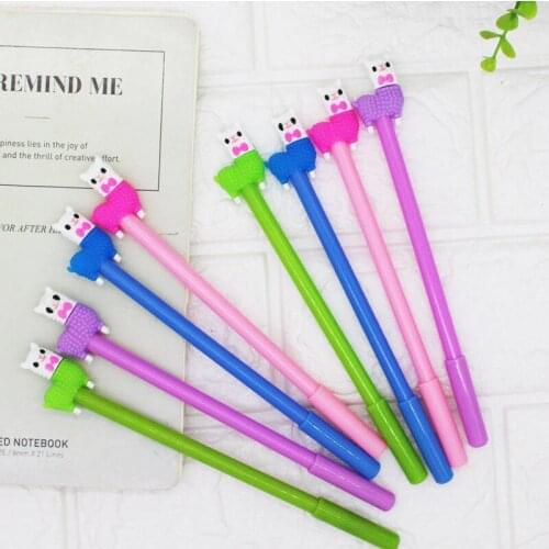 24pcs PVC soft cartoon gel pen stereo doll black signature pen student stationery gifts