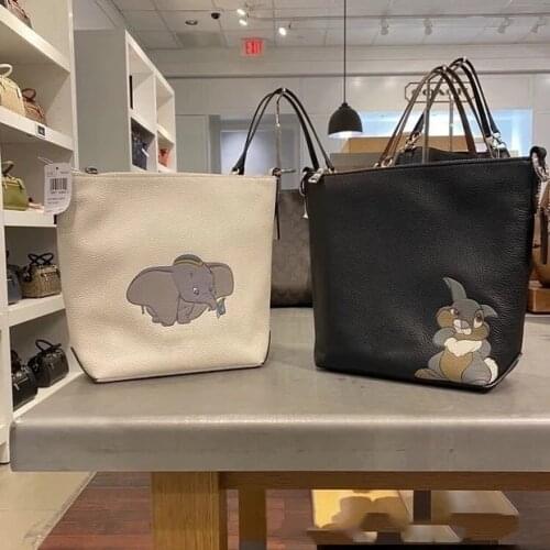 Disneys new Dumbo Lady fashion one-shoulder messenger mobile phone bag simple bucket handbag outdoor travel storage bag