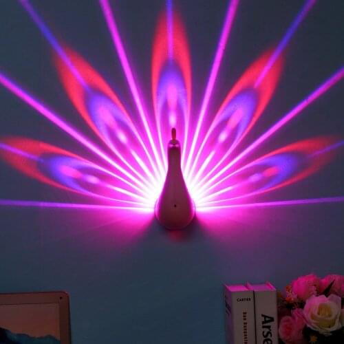 Peacock projection lamp New and strange LED night light USB Creative home Lover gift Small wall lamp Seven color remote control