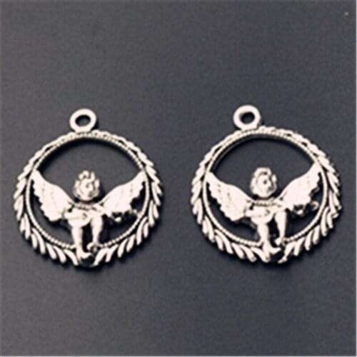 WKOUD 10pcs Silver color Hollow Elliptical Wings boy Marker Alloy Pendant For Necklace Earrings DIY Jewelry temperament A814