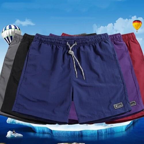 2021 New Summer Men Shorts Running Sport Fitness Shorts Casual Breathable Quick Dry Pants Pockets Beach Solid Color Sport Shorts