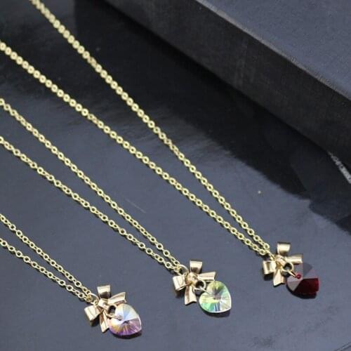 Japanese and Korean simple red powder white tri-color glass heart bow bow pendant necklace factory direct