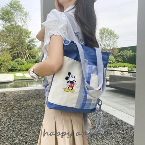 Disneys Mickey Mouse canvas large-capacity shoulder bag student portable tuition school bag work travel leisure storage bag