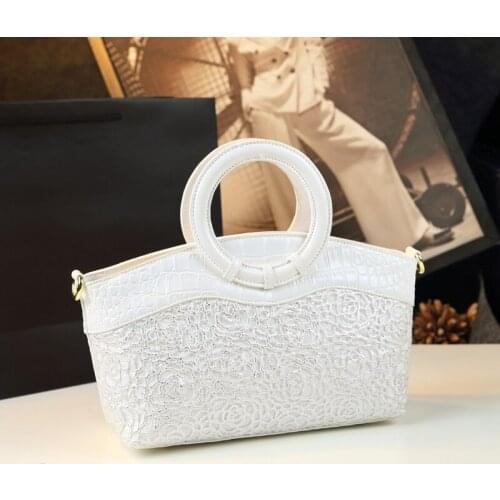 Geometric Personalized round Handle Handbag Women Bag 2021 New Lace Middle-Aged Mother Bag Genuine Leather Womens Tote Bags
