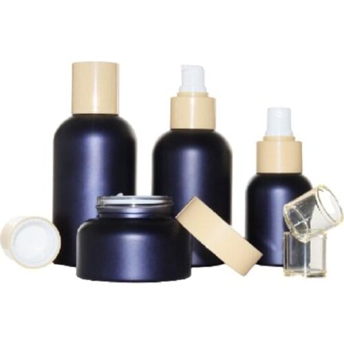 Empty Cosmetic Packaging 50G Cream Jar Plastic Lid 40ML 100ML 120ML Matte Frost Dark Blue Glass Spray Lotion Pump Toner Bottle