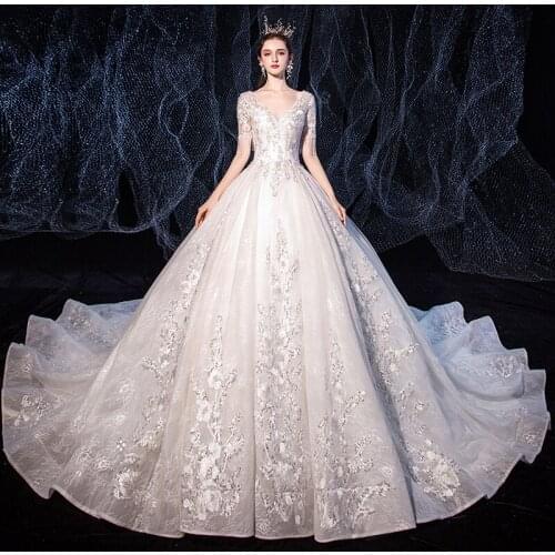 Sequins Wedding Dress Sexy Deep V-Neck Tassel Short Sleeves Simple Beading Bling Luxurious Lace up Long Women Bride Dresses B054