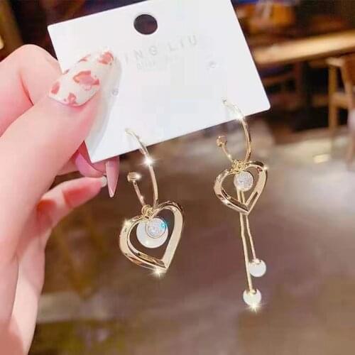 Simple design hollow gold heart-shaped earrings ladies new fashion earrings pierced opal pendant earrings gifts Women jewelry