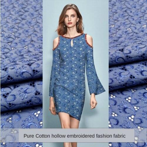High-end 100% cotton blue hollow embroidery fabric spring, summer and autumn womens dress windbreaker jacquard fabric DIY