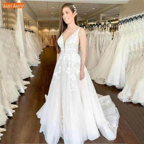 Elegant Sleeveless Boho Ivory Wedding Gowns V Neck Appliqued Lace A Line Wedding Dresses Long 2020 Sexy Custom Made Bridal Dress