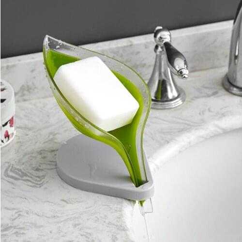 The new suction cup soap box exquisite vertical suction cup drain soap rack leaf-type toilet laundry soap rack