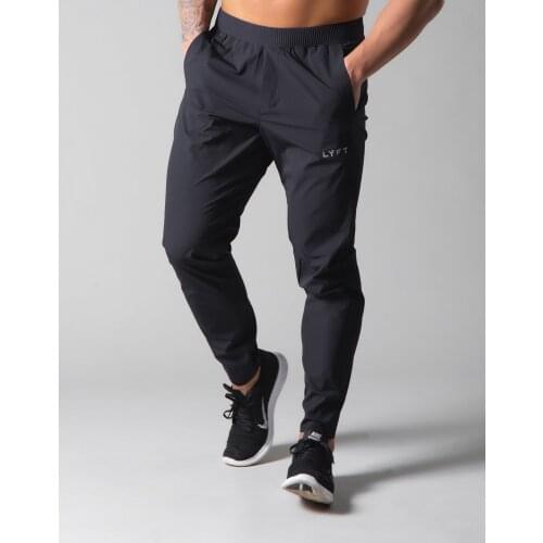 New mens elastic force muscle fitness running training sports body-building trousers breathable Slim beam mouth gym casual pants
