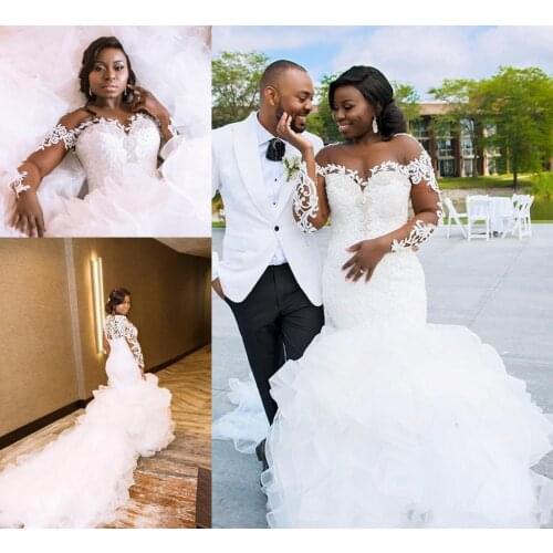 African Mermaid Wedding Dresses Sheer O-neck Illusion Lace Applique Long Sleeve Ruffles Cathedral Train Wedding Gown