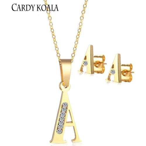 Stainless steel A-shaped pyramid with zircon simple generous golden necklace earrings set
