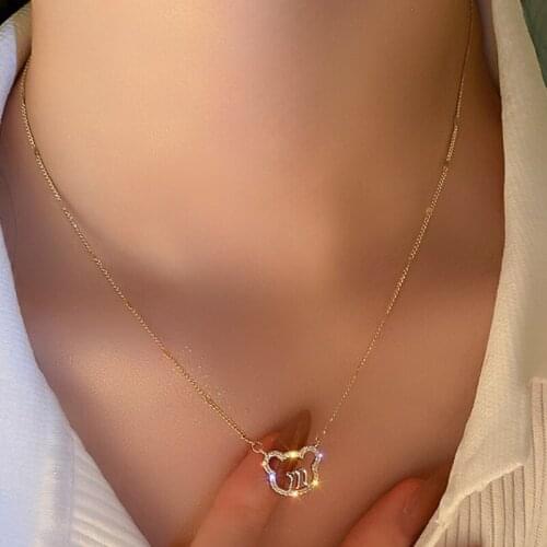 U-Magical Textured Hollow Out Bear Head Pendant Necklace for Women Shining Letter M Rhinestone Metallic Necklace Jewellery