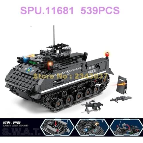 67285 539pcs Police Swat Tracked Armoured Vehicle Tank Vehicle With Light Sound 2 Dolls Building Blocks Toy
