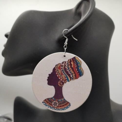 African woman wooden earrings