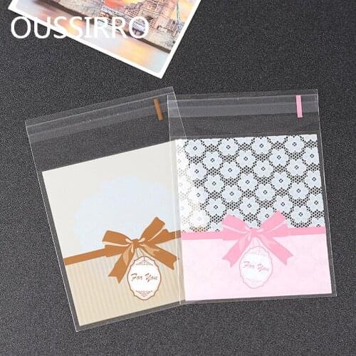 50Pcs/Lot New Year Gift Bag Cute Plastic Bag Bow tie Self-adhesive Christmas Biscuit Packaging Bags Candy Cookies Bag Party