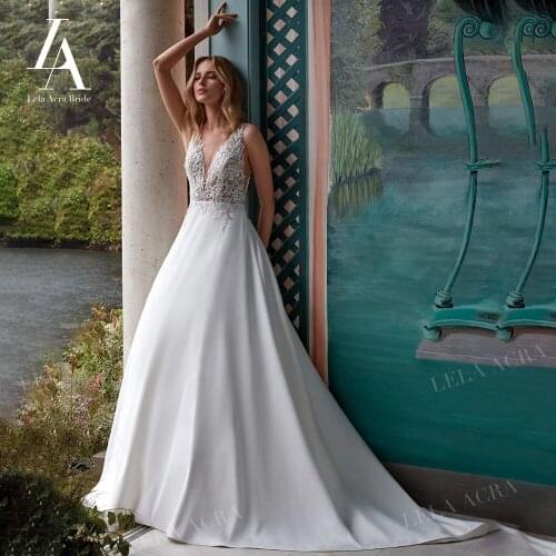 LelaAcra Sleeveless Wedding Dress 2022 Beading V-neck Satin ALine Backless Plus Size Princess Bride Gowns NE38 Vestido de Noiva