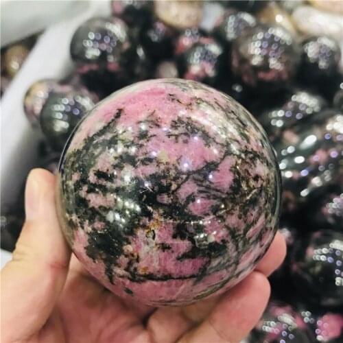 Natural rose crystal balls are used for home decoration and feng shui