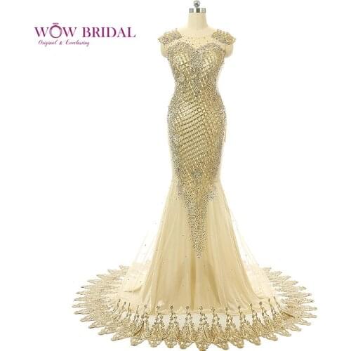 Wowbridal 2021 Elegant Fancy Evening Dresses Sheer Boat Neck Beaded Cap Sleeve Cross- Cross Pattern Beaded Chiffon Mermaid Gowns