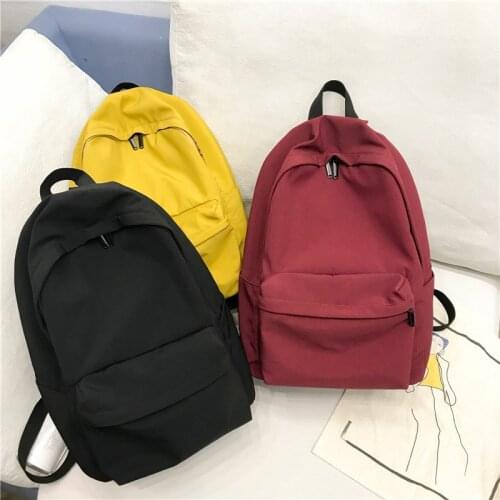 Pure color backpack casual backpack without printing men and women bag student school bag