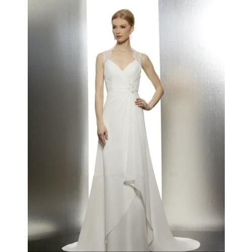 Soft schiffli lace cap sleeves etheral keyhole back chiffon A-line pleated bodice accentuated beaded appliques wedding dresses