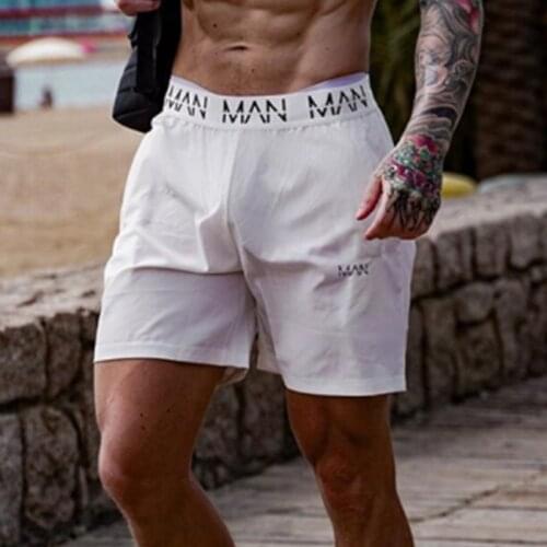 Gyms Shorts Men Black White Compression Fitness Shorts Men Bodybuilding Causal Shorts Male Summer Quick Dry Spandex shorts Homme