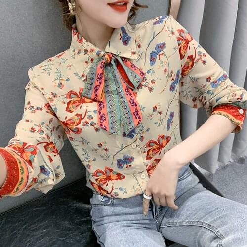 European ribbon flower shirt lapel single-breasted female temperament of the new Spring Festival loose women coat