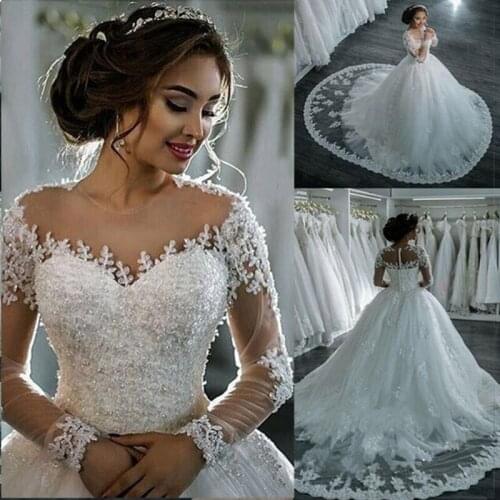 Robe de mariage Ball Gown Wedding Dress 2020 Long Sleeves Skin Tulle Wedding Gowns Luxury Beaded Bride Dresses Vestido de Novia