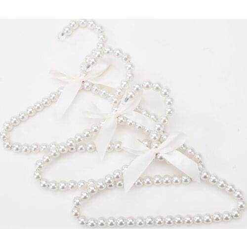 5pcs/lot 20cm plastic baby clothes rack. Pearl pet coat hanger