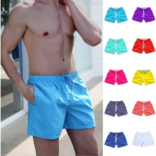 XIYOUNGYOUNG Men's Sports Swimming Trunks