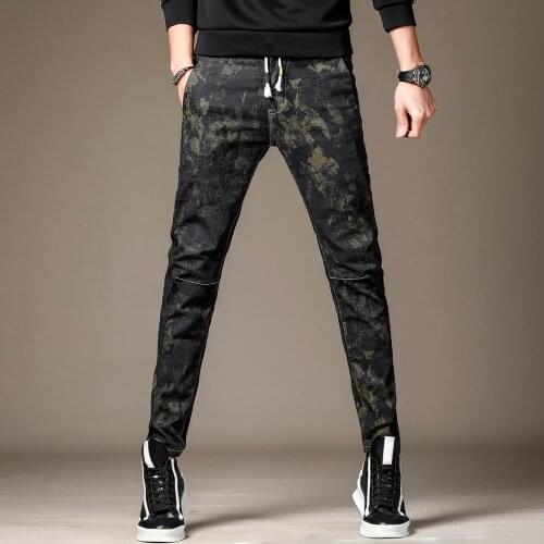 Free Shipping 2019 New mens male trousers denim pants Autumn jeans self-cultivation stretch Korean dark gold camouflage