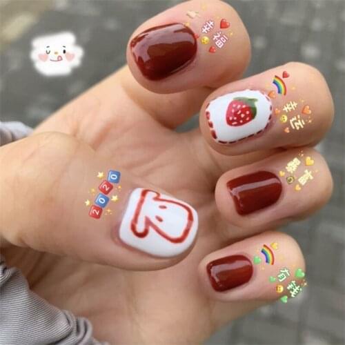 Cute strawberry and cartoon pattern fake nails Japanese short size pure color false nails 24pcs with glue lady full nail tips