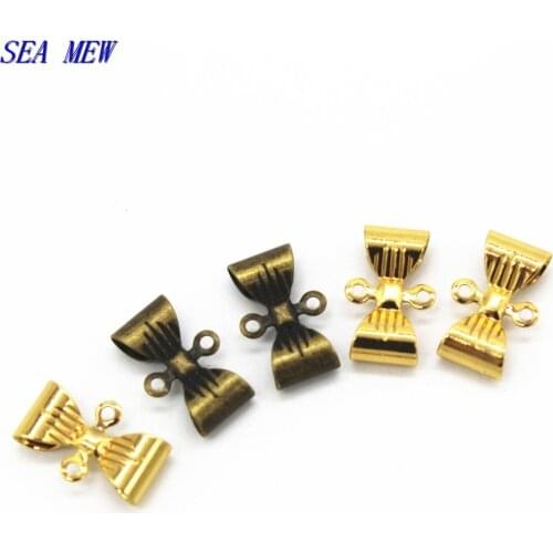 SEA MEW 200 PCS 7*12mm Metal Copper Rhodium Gold Silver Color Bowknot Pendant Charms With 2 Loop Connector For Jewelry Making