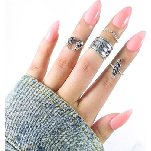 Jewdy 4PCS/Set Boho Wings Midi Finger Ring Set Vintage Punk Carved Knuckle Feather Rings for Women Anillos Party Jewelry