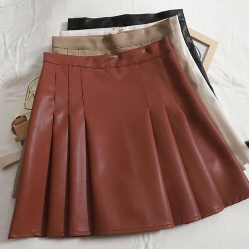 Korean version of pleated short skirt womens autumn new all-match PU leather high waist solid color hip skirt