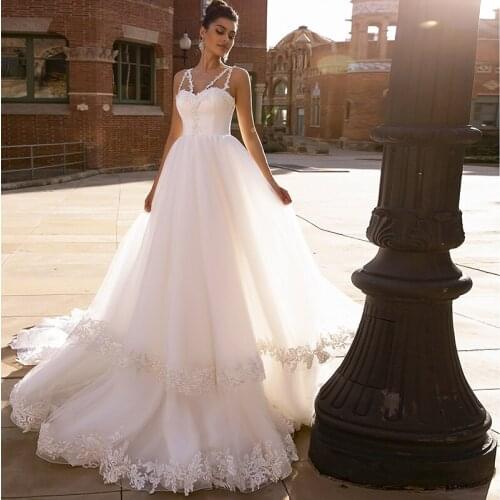 Spaghetti Straps Beach Wedding Dress Famous A Line Appliques Ruffles Sweep Train Bridal Gown robe de soirée de mariage