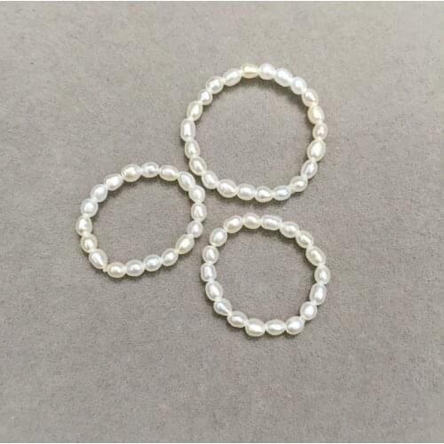 Wholesale 1-2MM Natural fresh water pearl tail ring rice shape tiny pearl fashion women jewelry simple pearl ring 20pcses/lot