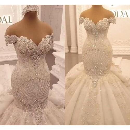 Luxury Appliques Lace Mermaid Wedding Dresses Off Shoulder Crystal Backless Ruffles cathedral train Arabic Dubai Bridal Gown
