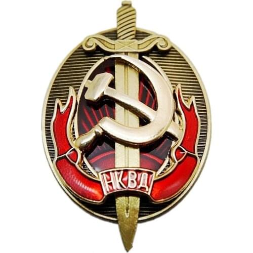 NKVD multilayer copper enamel shield and sword badge of the early KGB interior ministry