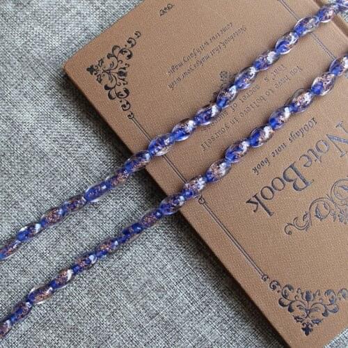 About 9x16mm murano twisted glass beads,about 2.0mm in hole size,12 pieces per lot,all hand made,high quality