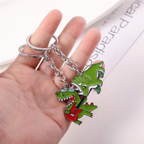 Trendy Metal Dinosaur Playing Instrument Key Chain Men Women Keychain Keyrings Fun Green Dinosaurs Couples Pendant Porte Clef