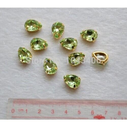 36pcs/lot 10x14mm teardrop highest quality K9 light green crystal sew on stones beads with gold claw no any scratch dirty