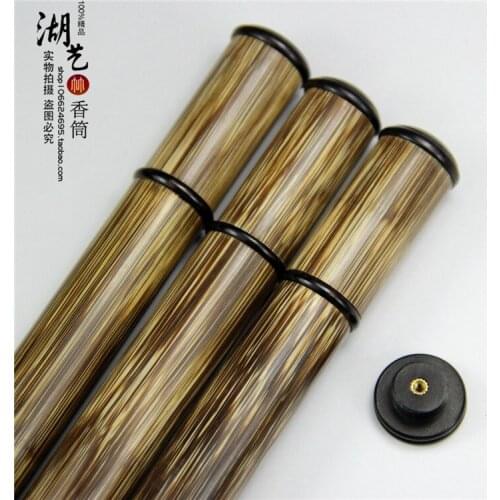 Delicate gold silk and ebony brief paragraph with inserted joss stick cylinder aloes lie sweet fume sweet sweet incense box tube