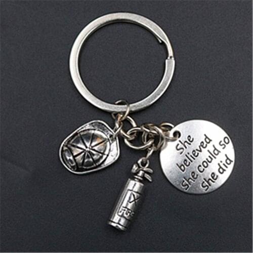 WKOUD 1pc She Believed She Could So She Did Charm Fireman Helmet Fire Extinguisher Alloy Pendant DIY Handmade Jewelry key Chains