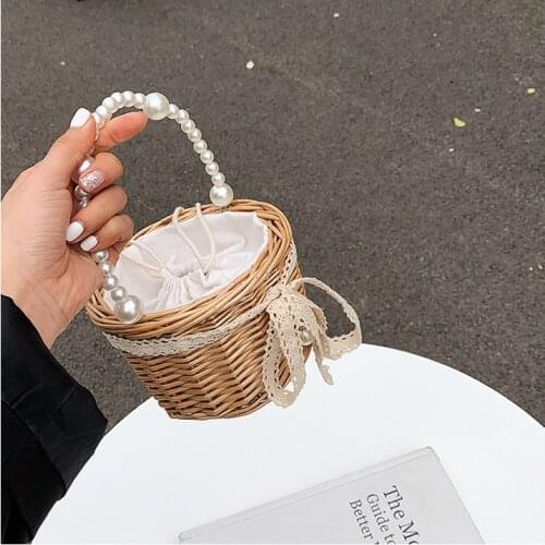 Beach Holiday Elegant Bowknot Drawstring bag Handle Small Wallet Vintage Womens Rattan Woven bags Pearl Basket shoulder bag