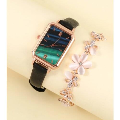 Fashionable casual vintage Roman Quartz Feminine Leather Watch Sky Fantasy Style minimalist bracelet watch Lucky five-leaf grass